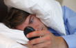 using phone in bed